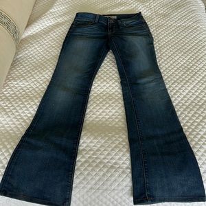 J Brand “heartbreaker bootleg” style dark wash low rise flare denim